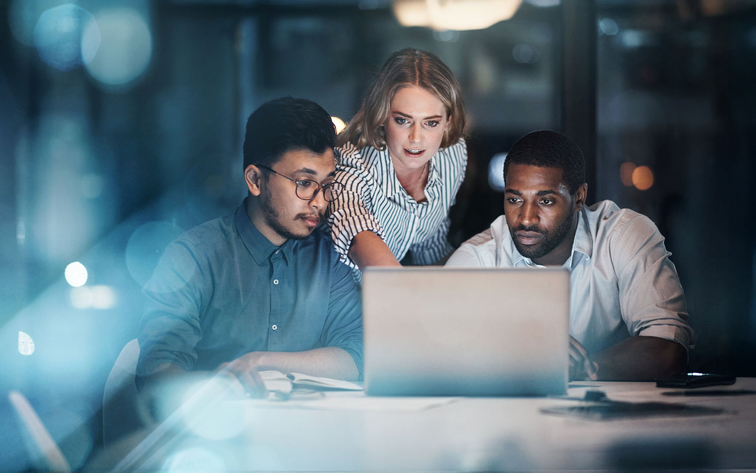 cropped-shot-of-three-young-businessmpeople-working-1322205588