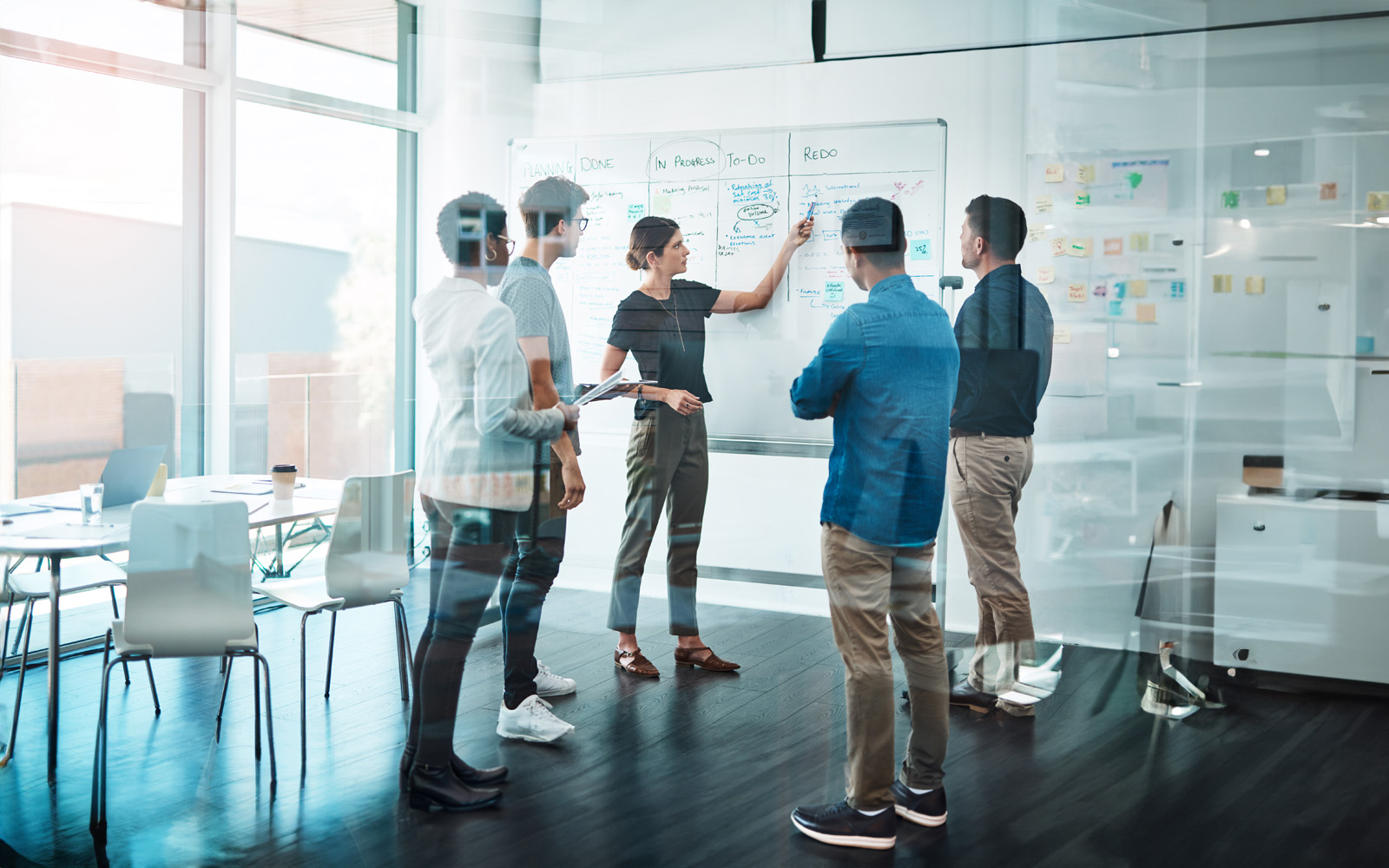 group-of-business-people-having-a-meeting-1147479610