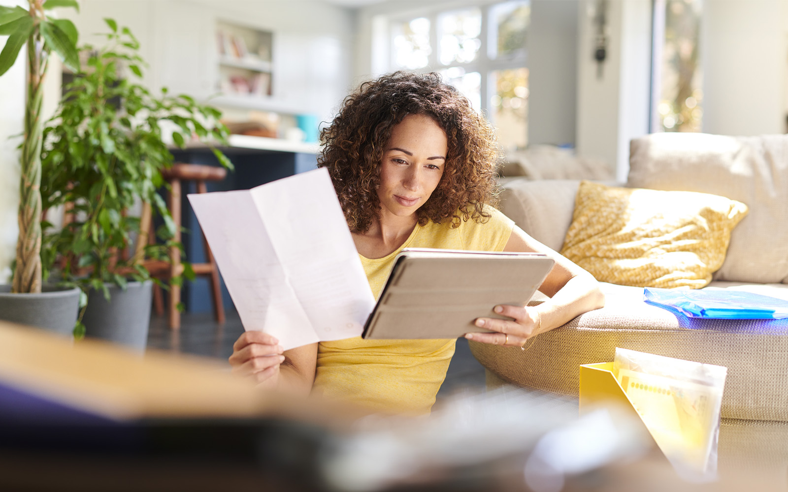 woman-reading-on-tablet-1156486392