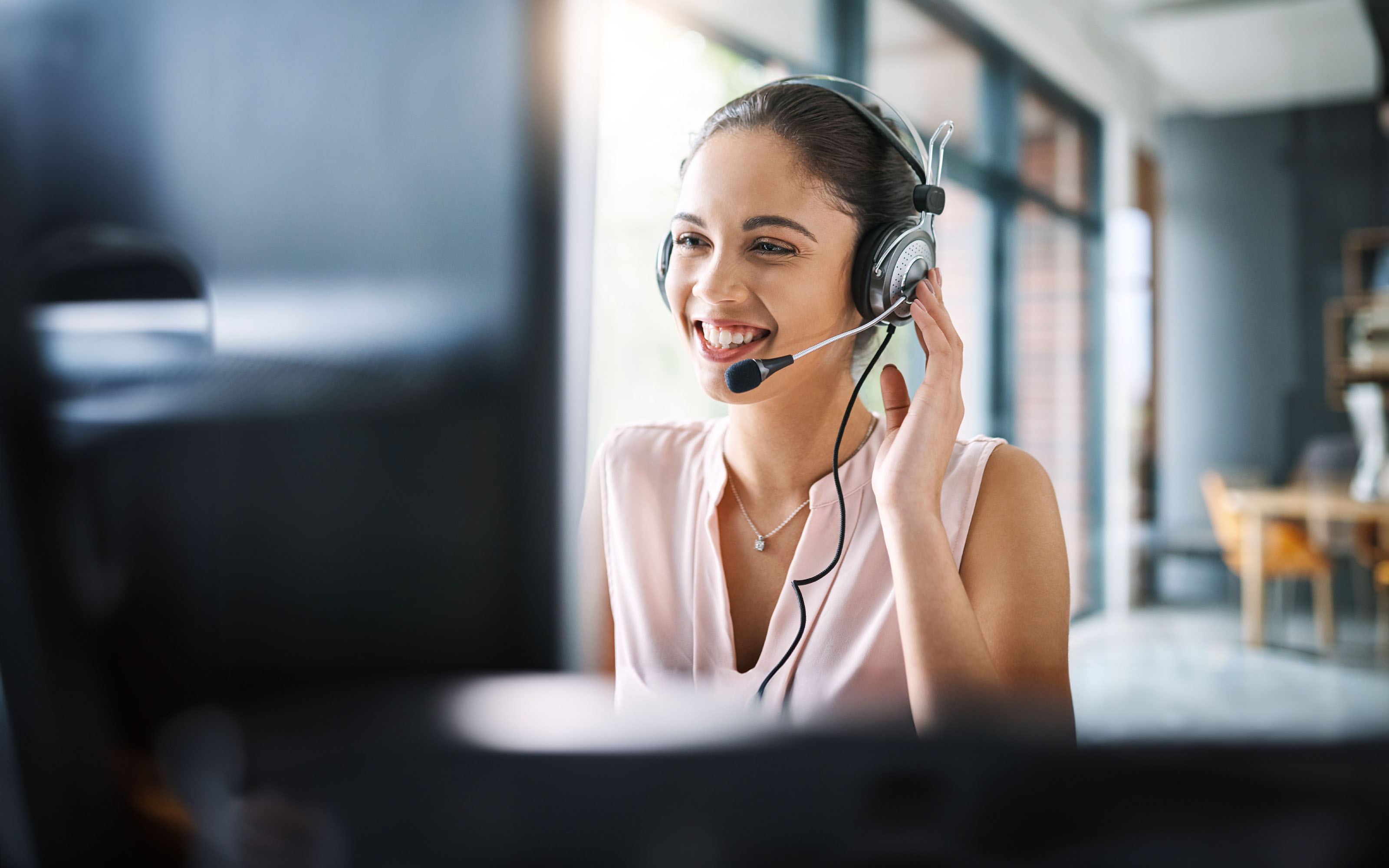 woman-working-in-call-center-1132731920