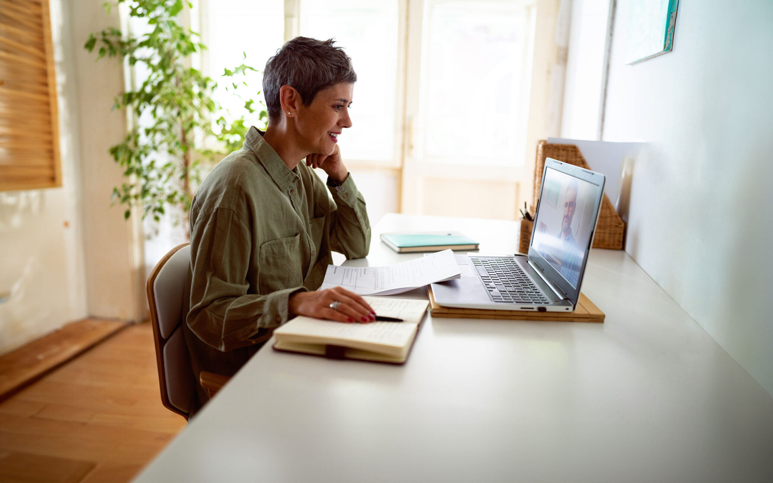 woman-following-online-courses-on-her-laptop-1419631265-4-scaled